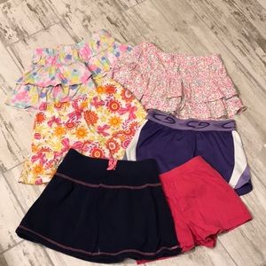 3 skorts, 2 short, and a skirt